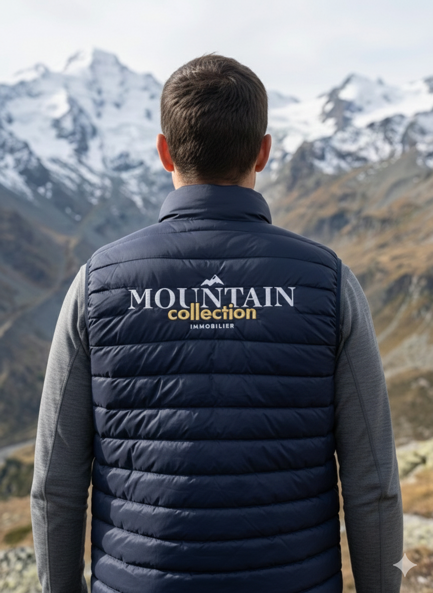 D&eacute;tail broderie logo sur veste sans manche par SMTK Montm&eacute;lian